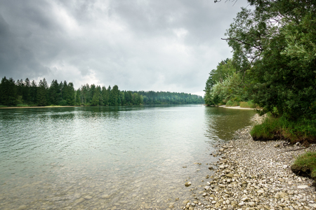 Scenic view of trees and lake against cloudy sky; Germanyの写真素材