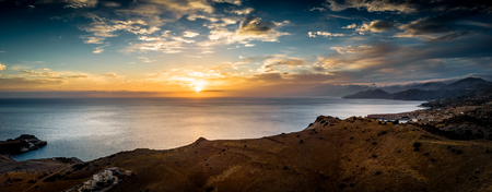 Panoramic view of mountain and sea during sunset; Crete; Greeceの写真素材