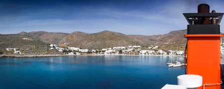 Seascape and mountain with industrial ship Milos Island Greeceの写真素材