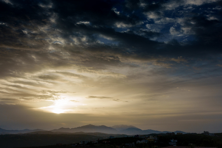 Scenic view with dark clouds and a ray of light Crete Greece Europeの写真素材