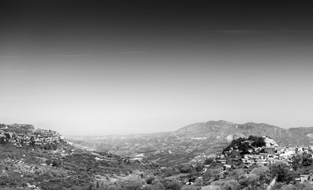 Aerial view of urban skyline with mountains in backdrop Crete Greece Europeの写真素材