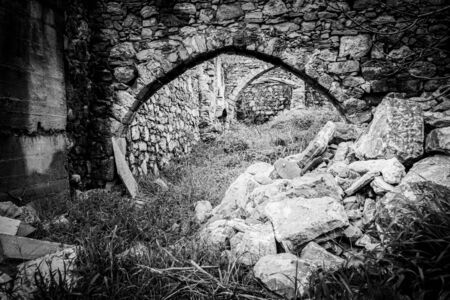 View of ancient weathered stone structureの写真素材
