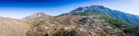 Scenic mountain landscape against sky, Crete, Greeceの写真素材