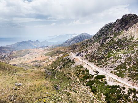 High angle view of rocky mountain with mountain passの写真素材