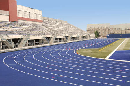 Picture of a track and field stadium with empty standsの写真素材
