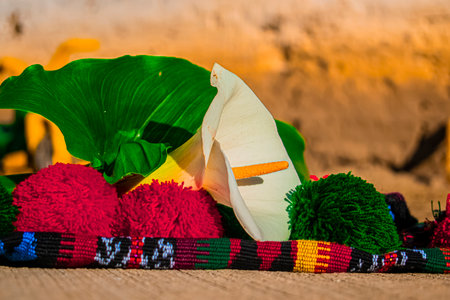 Buddhist prayer beads and flowers on the beach, Thailand.の写真素材