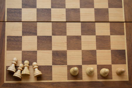 Concept of social distancing and its benefits, represented with chess pawnsの写真素材