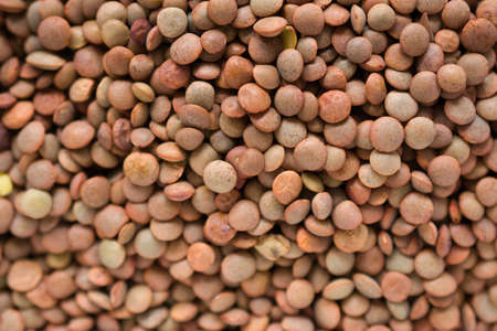 Raw lentils, close view of them. Healthy vegetable, iron and proteins sourceの写真素材