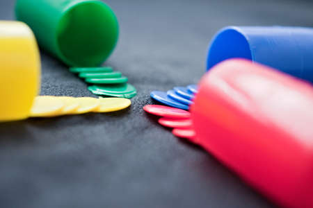 four beakers, making a cross with four pawnsの写真素材