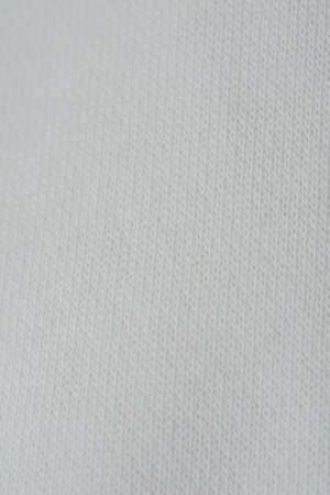 White fabric pattern with the threads going vertically, background designの写真素材