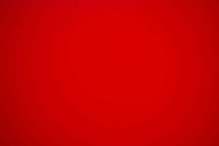 Cherry red background, cardboard texture full of copy spaceの写真素材
