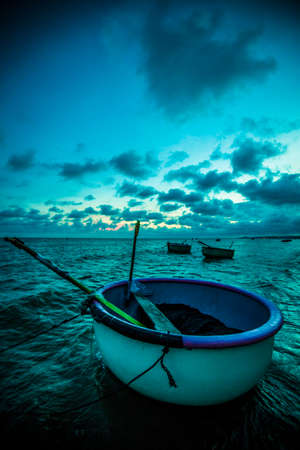 sunset at mui ne beach in vietnamの写真素材