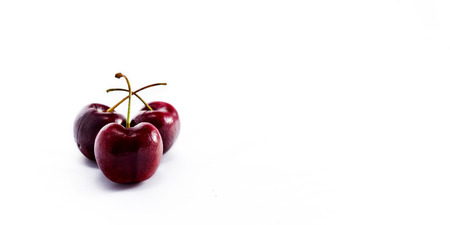 Cerise isolated on white の写真素材