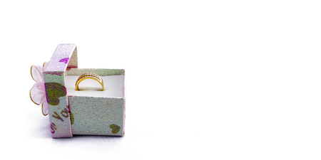 Ring with gift boxes isolated on white の写真素材