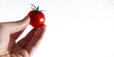 Tomato isolated on white の写真素材