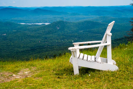 White Adirondack Chair atop a Ski Resort in Summerの写真素材
