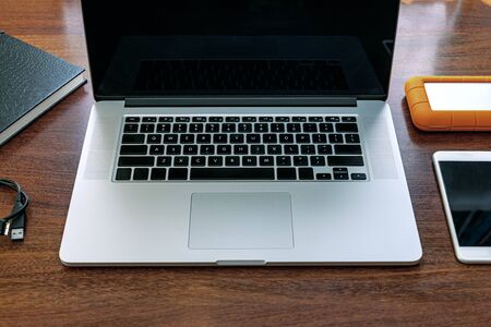 View of the black screen of the laptop, a device to work at home, do research, agenda, HD, cell...