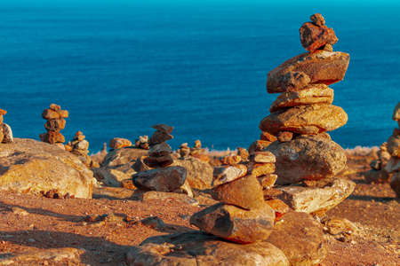 Tower of yellow stones with sand, on the plateau on Madeira Island.の写真素材