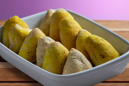 Garlic sfiha (esfiha, esfirra) of Arabic origin Vegan.