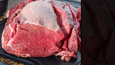 Preparation with fresh beef tenderloin over the sink. Selective focus. Space for text.の写真素材