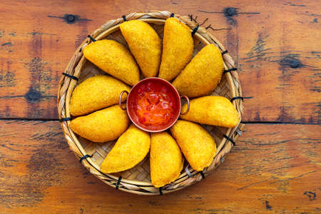 Angu pastry, with free-range chicken filling and now pro-nobs. Accompanying pepper jelly. Brazilian...