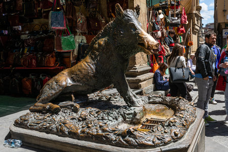 Fontana del Porcellino, Florence, Italy - July 05, 2019: People visiting the bronze statue of the wild boar in Florence, Italy.のeditorial素材