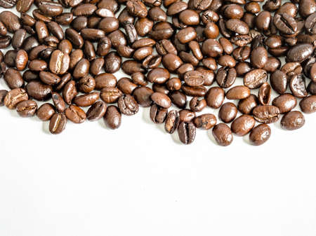 Fried coffee beans with white background closeupの写真素材