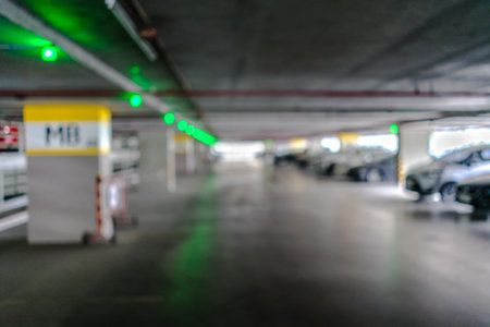 Indoor parking lot building blurred background and bokeh lightの写真素材