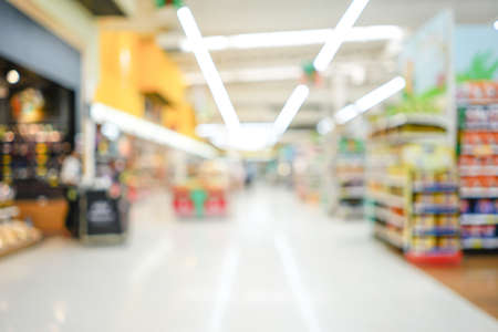 Shopping mall or department store with blurred background and bokeh lightの写真素材