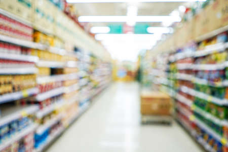 Shopping mall or department store with blurred background and bokeh lightの写真素材