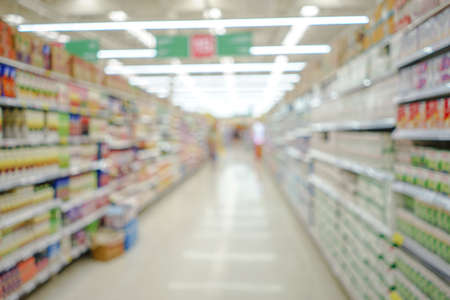 Shopping mall or department store with blurred background and bokeh lightの写真素材