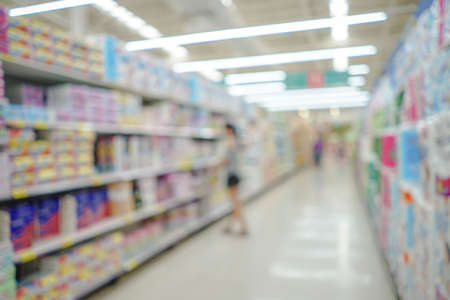 Shopping mall or department store with blurred background and bokeh lightの写真素材