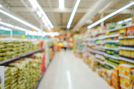 Shopping mall or department store with blurred background and bokeh lightの写真素材