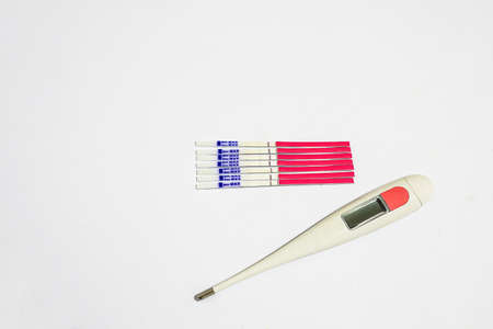 7 days of LH ovulation test strip with thermometerの写真素材