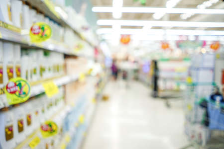 Shopping mall or department store with blurred background and bokeh lightの写真素材