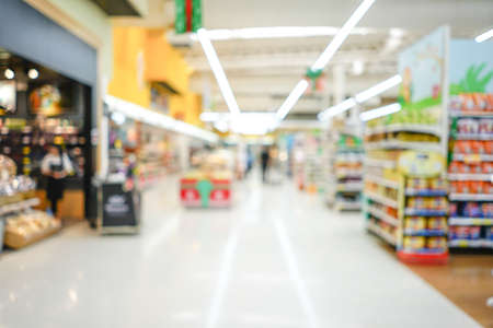 Shopping mall or department store with blurred background and bokeh lightの写真素材