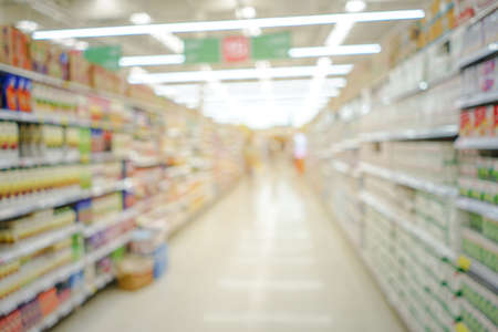 Shopping mall or department store with blurred background and bokeh lightの写真素材
