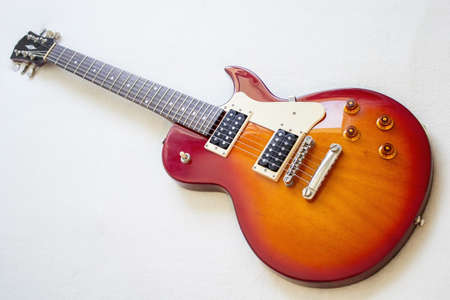 Guitar model Les Paul, red and yellow