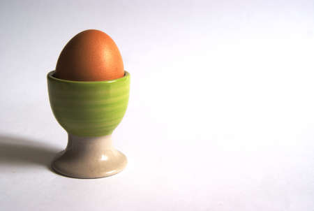 Easter egg cup on white backgroundの写真素材