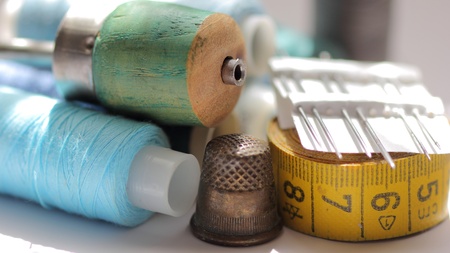Various accessories for needlework thread, thimble, centimeterの写真素材