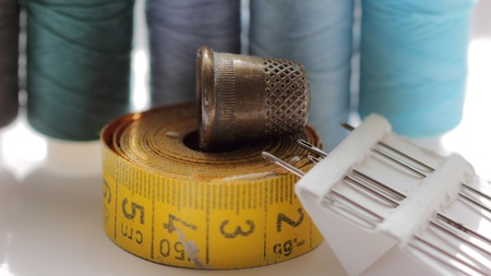 Various accessories for needlework thread, thimble, centimeterの写真素材