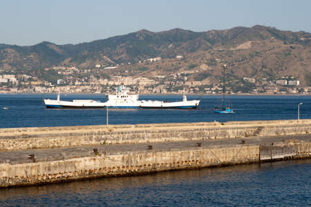 Fishing boat in the Strait of Messinaのeditorial素材