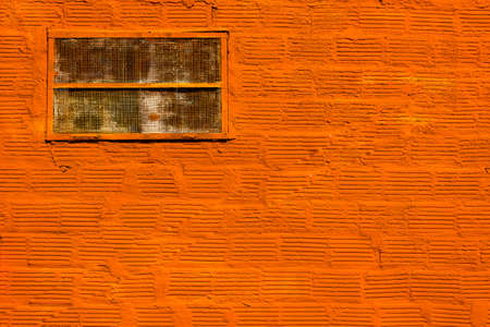 Orange Painted Brick Wall for Backgroundの写真素材