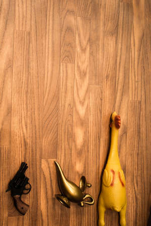 A Gun, A Genie Lamp, and a Chickenの写真素材