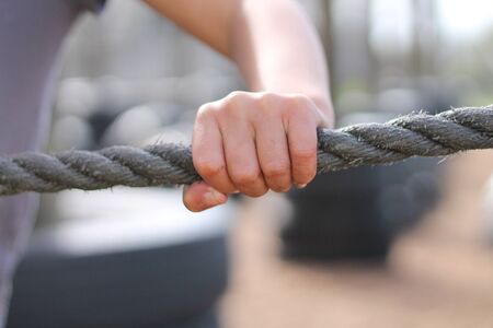 Hand gripping ropeの写真素材