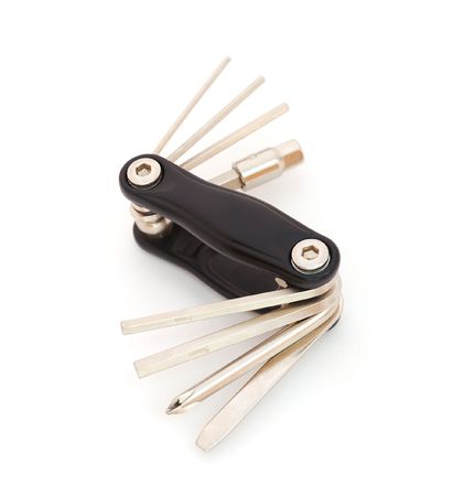 Metal bike tools isolated on a white background.