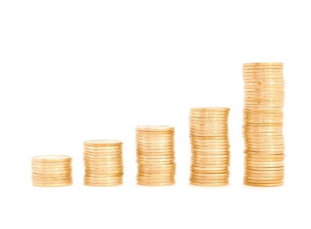 Rising stacks of coins on white background.の写真素材