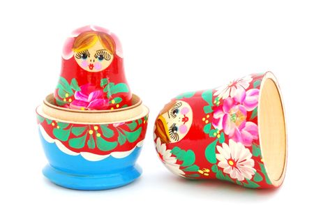 An opened Russian doll on white background.の写真素材