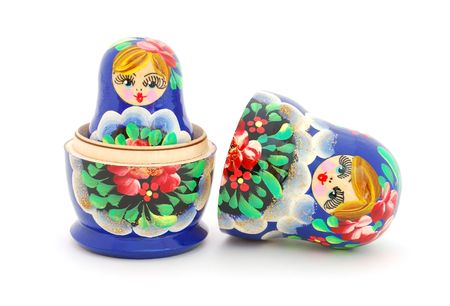 An opened Russian doll on white background.の写真素材