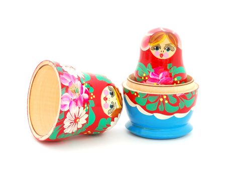 An opened Russian doll on white background.の写真素材
